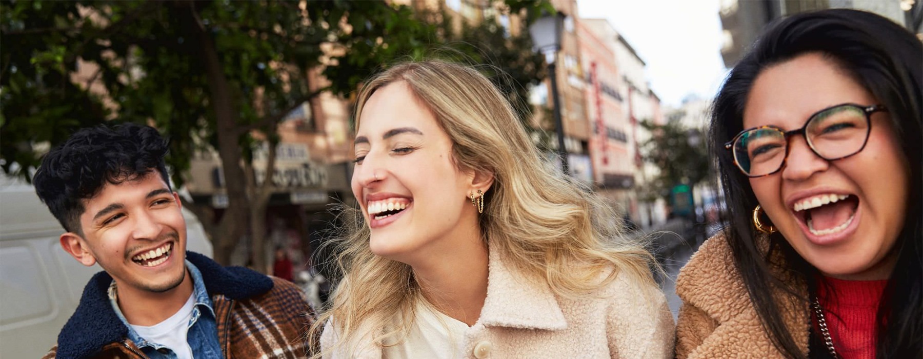 three people laughing