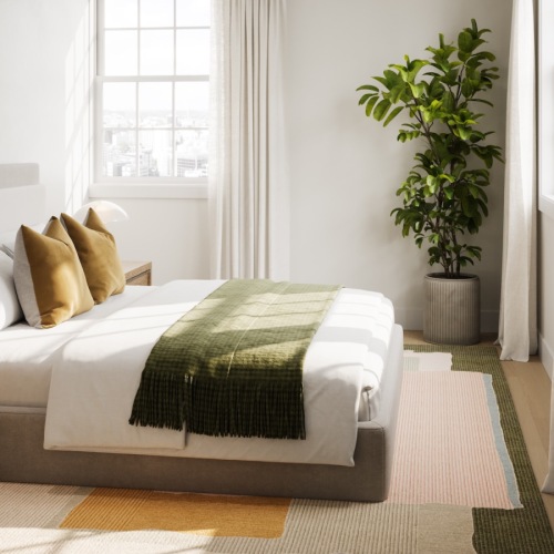 Bedroom with natural lighting and high ceilings