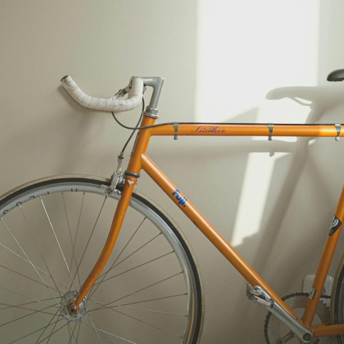 a bicycle parked in a room