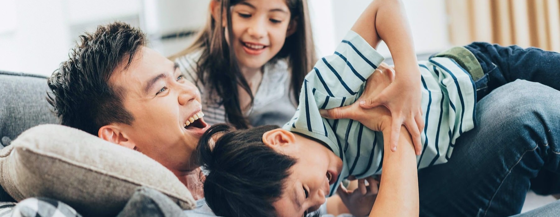 a family playing in a living room